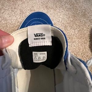 Van's Off the Wall hi-top shoes.